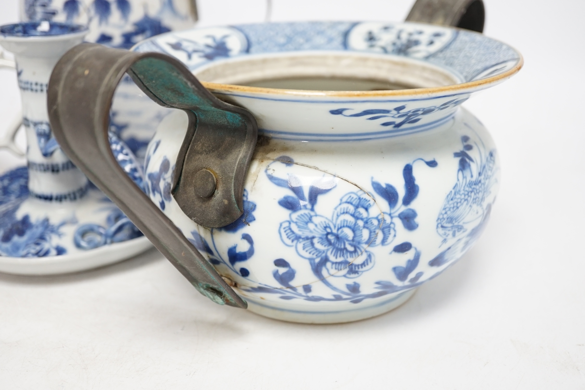 A group of five 18th century Chinese export ceramics to include a rare blue and white ‘dragon’ chamberstick, tallest 16cm. Condition - poor